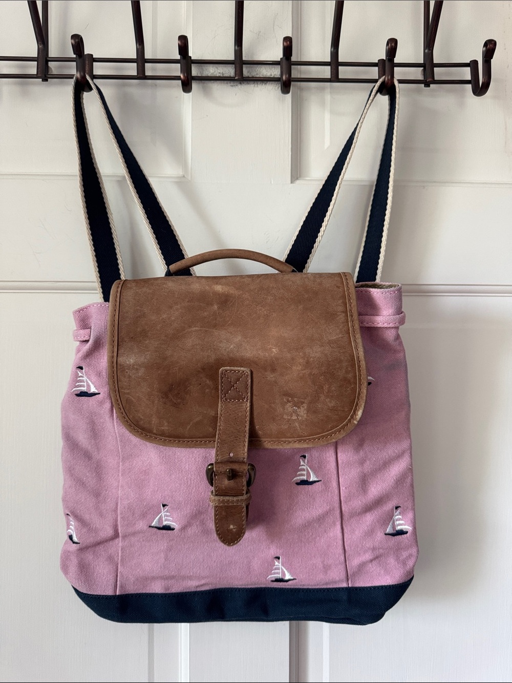 L.L. Bean Pink Canvas Backpack with Tan Leather Flap and Sail Boar Accents.